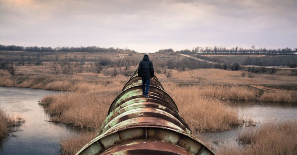 Person Walking a Pipeline, PickPik