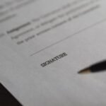 signing a document, boarding school safety kenya