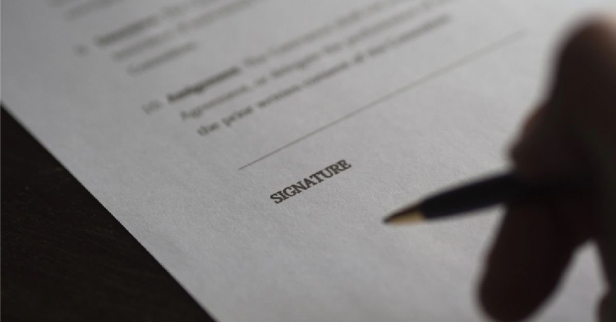 signing a document, boarding school safety kenya